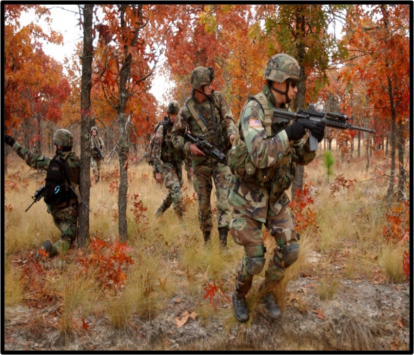  Fort Bragg ground troops on a training mission in a NC Forest